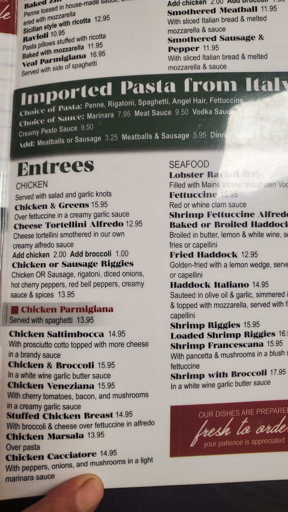 Printed menu with entrees and subs.